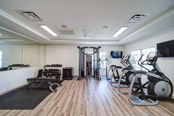 community fitness center with treadmills and workout equipment
